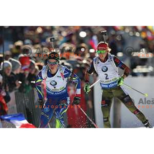 Laura Dahlmeier and Marie Dorin Herbert during BMW IBU World Cup Biathlon Women Pursuit 10km at Pokljuka, Slovenia on December 19, 2015