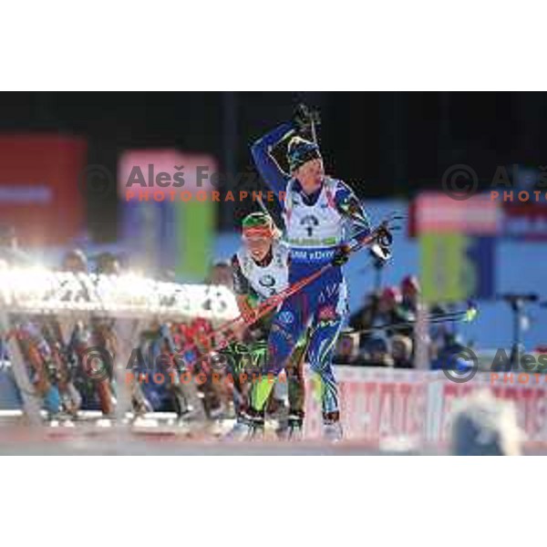 Laura Dahlmeier and Marie Dorin Habert during BMW IBU World Cup Biathlon Women Pursuit 10km at Pokljuka, Slovenia on December 19, 2015