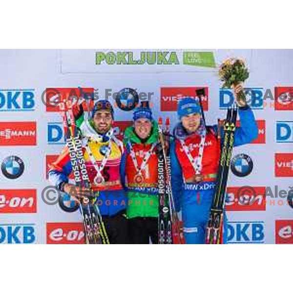 Martin Fourcade, Simon Schempp and Anton Shipulin during BMW IBU World Cup Biathlon Men Pursuit 12.5km at Pokljuka, Slovenia on December 19, 2015