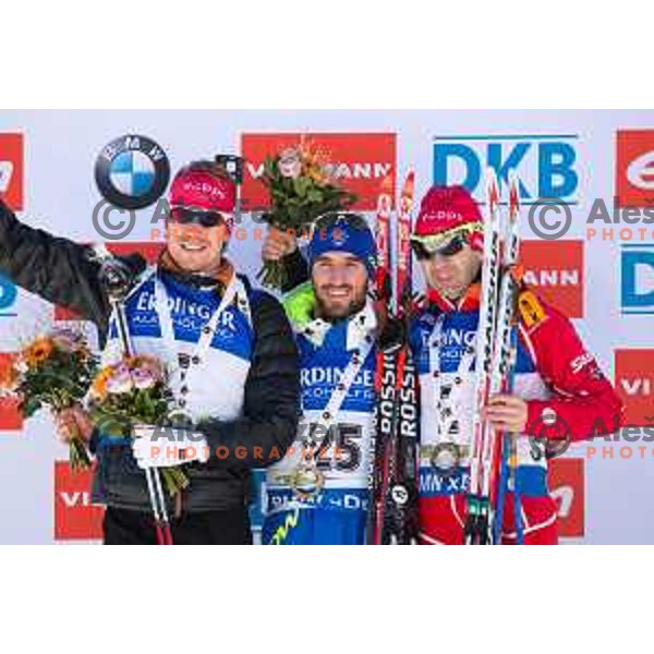 Emil Hegle Svendsen, Jean Guillaume Beatrix and Ole Einar Bjorendalen during BMW IBU World Cup Biathlon Men Mass Start 15km at Pokljuka, Slovenia on December 20, 2015