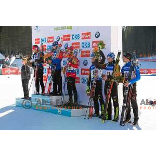 Emil Hegle Svendsen, Jean Guillaume Beatrix and Ole Einar Bjorendalen on podium during BMW IBU World Cup Biathlon Men Mass Start 15km at Pokljuka, Slovenia on December 20, 2015