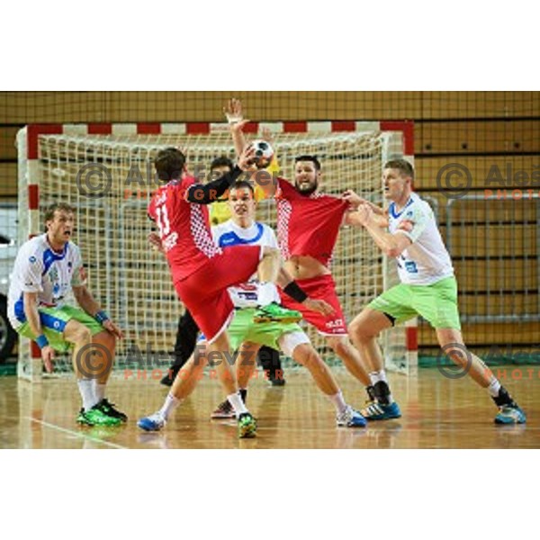 David Miklavcic, Vid Poteko, Blaz Blagotinsek in action during friendly handball match between Slovenia - Croatia, Bonifika, Koper, 09.01.2016