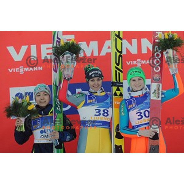 Sara Takanashi (JPN), winner Maja Vtic (SLO) and Spela Rogelj (SLO) at FIS Ski jumping Ladies World Cup in Ljubno, Slovenia on February 13, 2016