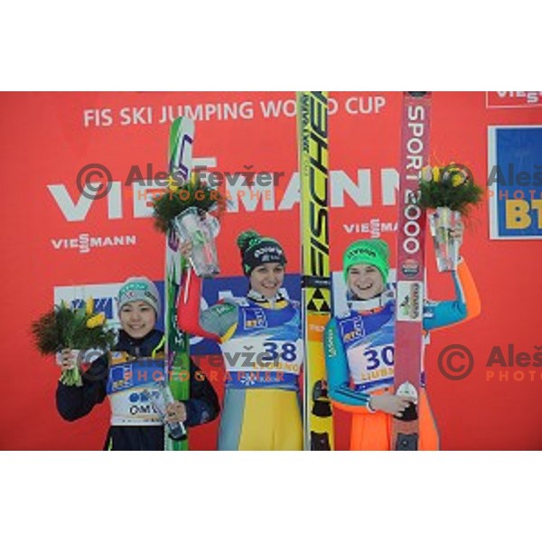 Sara Takanashi (JPN), winner Maja Vtic (SLO) and Spela Rogelj (SLO) at FIS Ski jumping Ladies World Cup in Ljubno, Slovenia on February 13, 2016