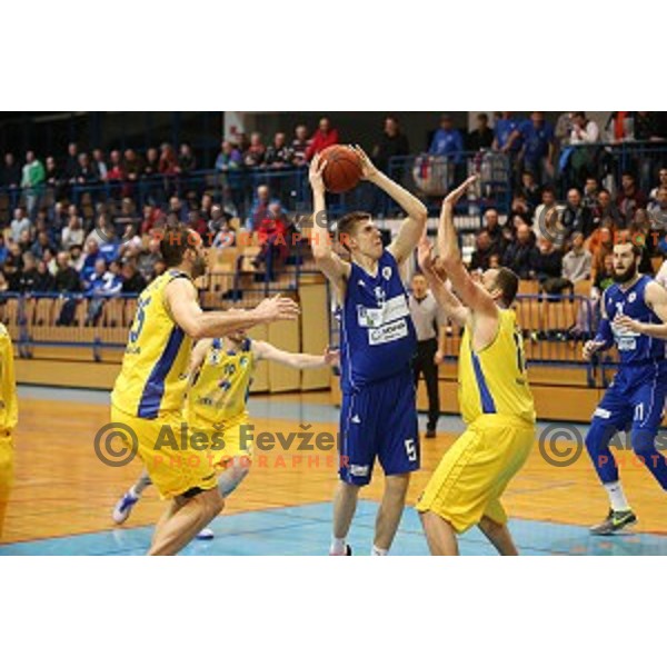Vlatko Cancar of LTH and jure Erzen of Sencur GGD in action during Telemach league basketball match between Sencur GGD and LTH Castings in Sencur Sports Hall, Slovenia on February 27, 2016