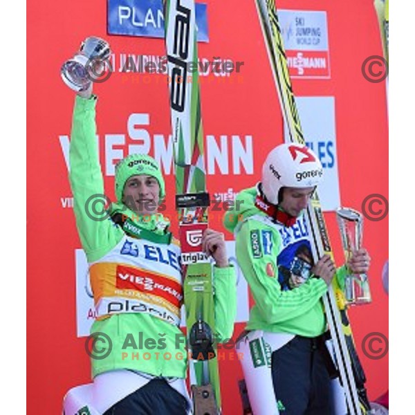 Peter Prevc (second place) and Robi Kranjec of Slovenia winner of Ski flying event during the Final of FIS Ski jumping World Cup Planica, Slovenia on March 18, 2016