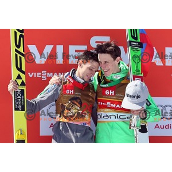 Robi Kranjec and Peter Prevc of Slovenia at Ski flying event during the Final of FIS Ski jumping World Cup season 2015/2016 in Planica, Slovenia on March 20, 2016