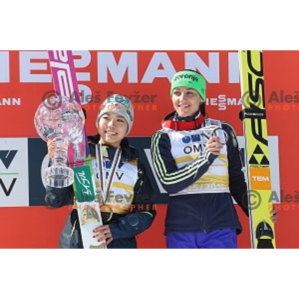 Sara Takanashi (JPN) overall winner of FIS Ski jumping World Cup season 2015/2016 and Maja Vtic (third place) in Planica, Slovenia on March 20, 2016