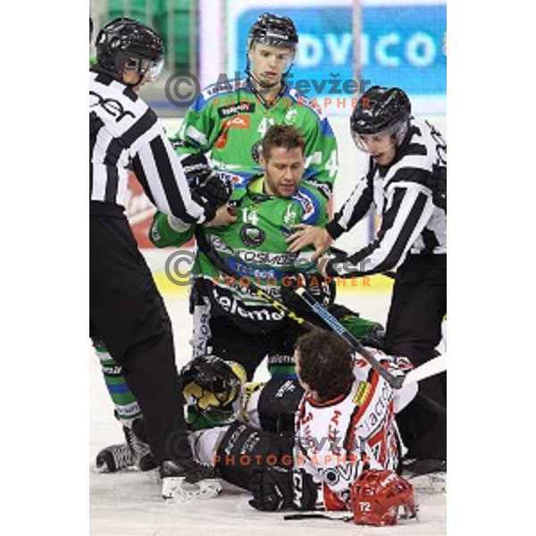 Matej Hocevar and Andrej Zidan in action during ice-hockey match Telemach Olimpija - SIJ Acroni Jesenice in the Final of Slovenian Championship, Tivoli Hall, Ljubljana, Slovenia on March 28, 2016