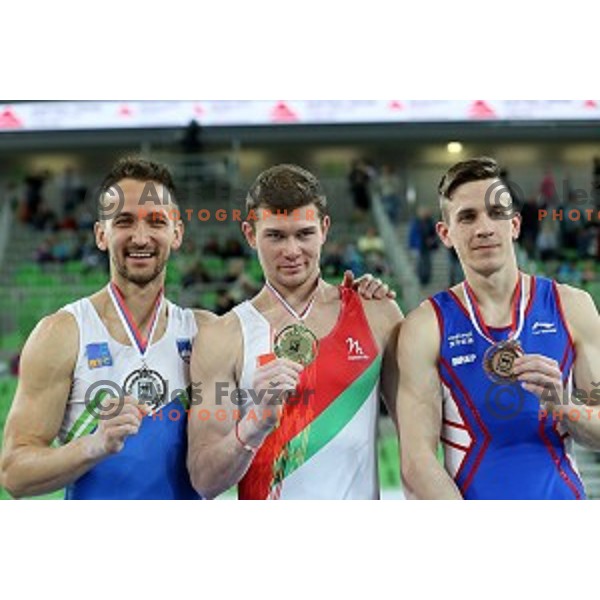Saso Bertoncelj of Slovenia, Vasili Mikkhalitsyn (BLR) and Kristijan Vugrinski (CRO) at Artistic Gymnastics World Cup in Stozice Hall, Ljubljana on April 9, 2016