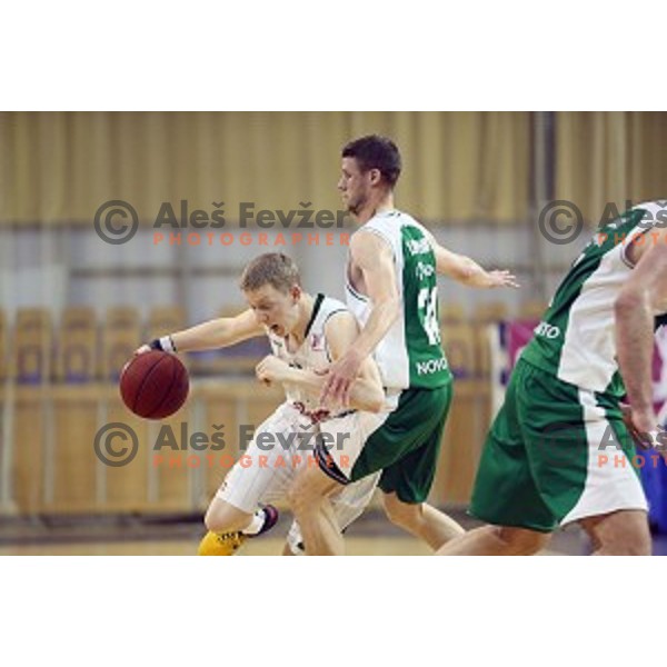 Miha Lapornik and Luka Lapornik in action in Nova KBM league basketball match between Union Olimpija and Krka in Tivoli Hall, Ljubljana, Slovenia on April 11, 2016