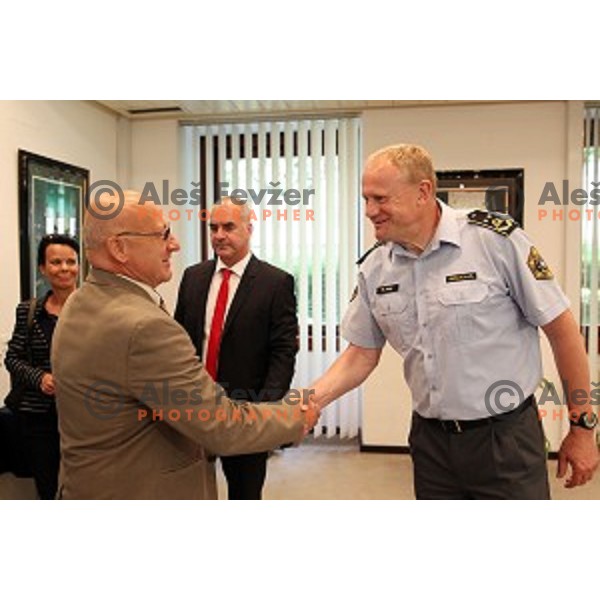 Bogdan Gabrovec, president of Slovenian Olympic Committee signs contract with Marjan Fank, general manager of Slovenian Police in Ljubljana, Slovenia on May 26, 2016