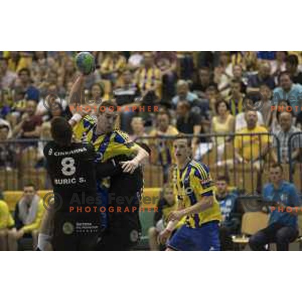 Celje\'s playmaker Miha Zarabec (23) and Gorenje\'s line player Senjamin Buric (8) in action during 1.NLB leasing league between Celje pivovarna Lasko and Gorenje Velenje, Zlatorog hall, Celje, Slovenia on May 27th, 2016