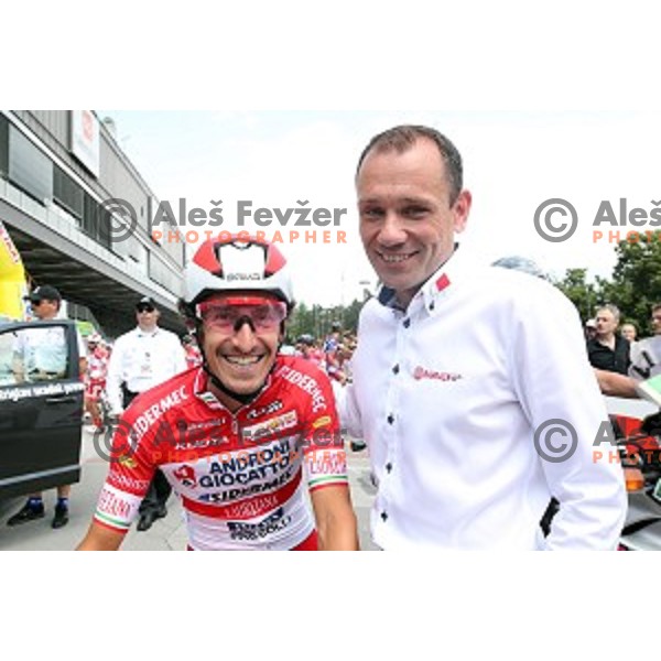 Franco Pellizotti of Adroni Giocattoli and Vladimir Miholjevic at official team presentation before start of first stage Tour of Slovenia 2016 in Ljubljana on June 16, 2016