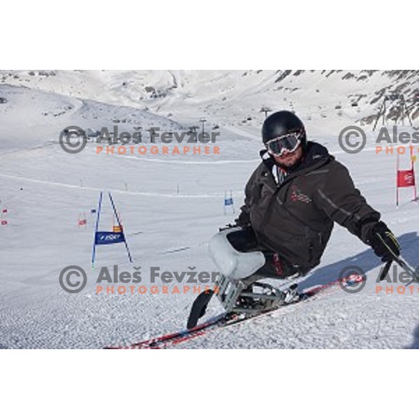 Paraolympic skier Dino Sokolovic of Croatia warms-up before skiing at Moelltal Glacier in Austria on April 14, 2016