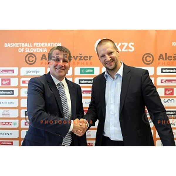 Miro Smrekar and Matej Erjavec, president of Slovenia Basketball Federation during KZS press conference in Radisson Blu Plaza hotel in Ljubljana, Slovenia on July 8, 2016