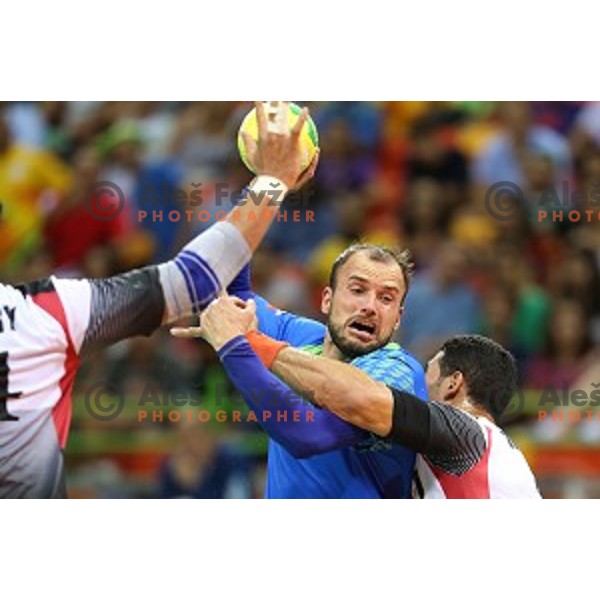 Uros Zorman of Slovenia in action during handball match between Slovenia and Egypt in Barra Olympic Park at Rio de Janeiro 2016 Olympic games , Brasil on August 7, 2016