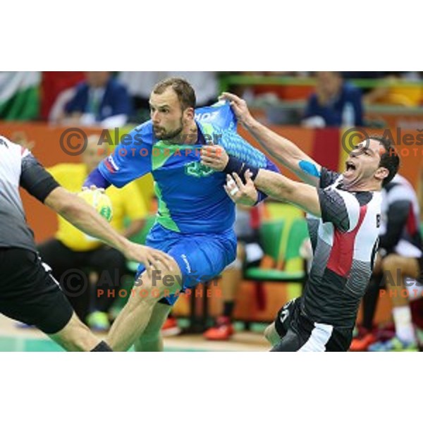 Uros Zorman of Slovenia in action during handball match between Slovenia and Egypt in Barra Olympic Park at Rio de Janeiro 2016 Olympic games , Brasil on August 7, 2016