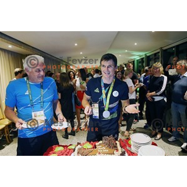 Peter Kauzer Sr. and Peter Kauzer Jr. at reception for Slovenian medalists at Rio de Janeiro 2016 Olympic games in hotel Windsor Excelsior on Copacabana , Brazil on August 10, 2016