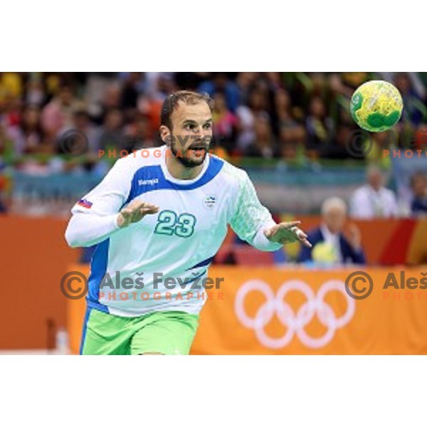 Uros Zorman of Slovenia in action during Olympic handball tournament match between Slovenia and Sweden in Barra Olympic Park at Rio de Janeiro 2016 Olympic games , Brazil on August 11 , 2016