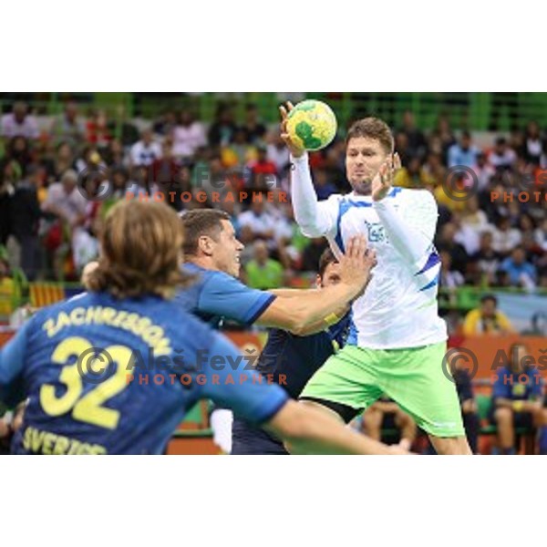 Marko Bezjak of Slovenia in action during Olympic handball tournament match between Slovenia and Sweden in Barra Olympic Park at Rio de Janeiro 2016 Olympic games , Brasil on August 12 , 2016