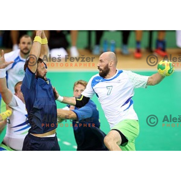 Vid Kavticnik of Slovenia in action during Olympic handball tournament match between Slovenia and Sweden in Barra Olympic Park at Rio de Janeiro 2016 Olympic games , Brazil on August 11 , 2016