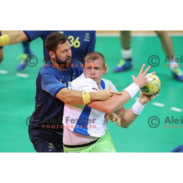 Matej Gaber of Slovenia in action during Olympic handball tournament match between Slovenia and Sweden in Barra Olympic Park at Rio de Janeiro 2016 Olympic games , Brazil on August 11 , 2016