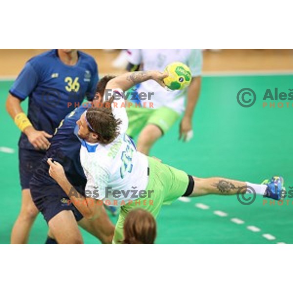 Dean Bombac of Slovenia in action during Olympic handball tournament match between Slovenia and Sweden in Barra Olympic Park at Rio de Janeiro 2016 Olympic games , Brasil on August 12 , 2016