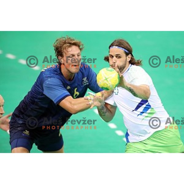 Dean Bombac of Slovenia in action during Olympic handball tournament match between Slovenia and Sweden in Barra Olympic Park at Rio de Janeiro 2016 Olympic games , Brasil on August 12 , 2016