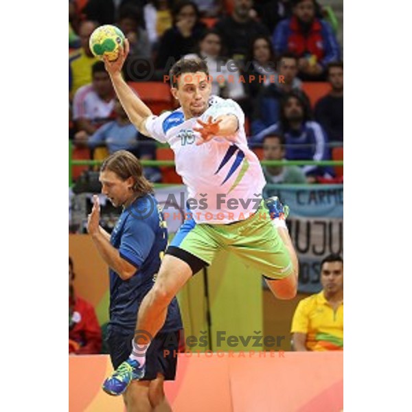 Darko Cingesar of Slovenia in action during Olympic handball tournament match between Slovenia and Sweden in Barra Olympic Park at Rio de Janeiro 2016 Olympic games , Brasil on August 12 , 2016