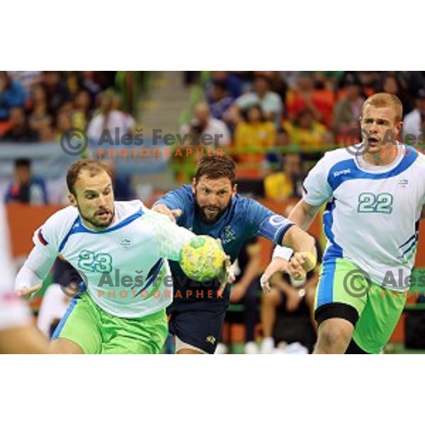 Uros Zorman of Slovenia in action during Olympic handball tournament match between Slovenia and Sweden in Barra Olympic Park at Rio de Janeiro 2016 Olympic games , Brazil on August 11 , 2016