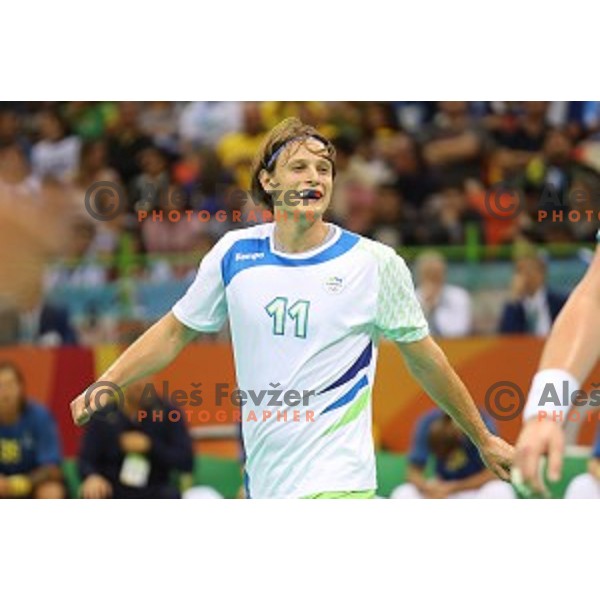 Jure Dolenec of Slovenia in action during Olympic handball tournament match between Slovenia and Sweden in Barra Olympic Park at Rio de Janeiro 2016 Olympic games , Brazil on August 11 , 2016