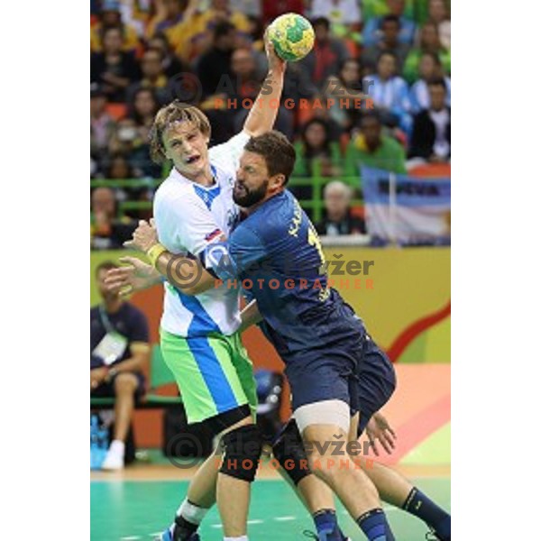 Jure Dolenec of Slovenia in action during Olympic handball tournament match between Slovenia and Sweden in Barra Olympic Park at Rio de Janeiro 2016 Olympic games , Brazil on August 11 , 2016