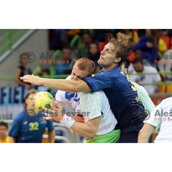 of Slovenia in action during Olympic handball tournament match between Slovenia and Sweden in Barra Olympic Park at Rio de Janeiro 2016 Olympic games , Brasil on August 12 , 2016