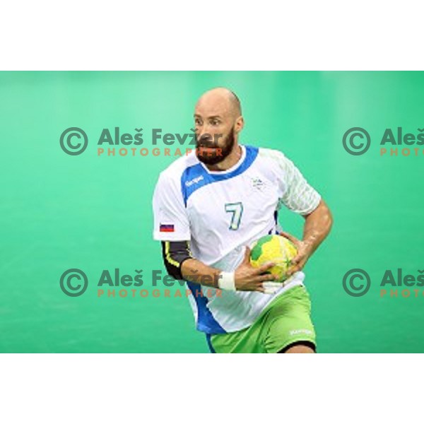 Vid Kavticnik of Slovenia in action during Olympic handball tournament match between Slovenia and Sweden in Barra Olympic Park at Rio de Janeiro 2016 Olympic games , Brazil on August 11 , 2016