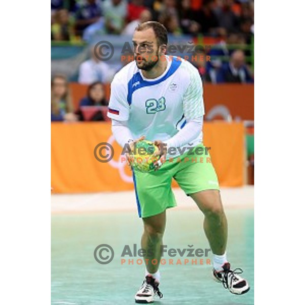 Uros Zorman of Slovenia in action during Olympic handball tournament match between Slovenia and Sweden in Barra Olympic Park at Rio de Janeiro 2016 Olympic games , Brazil on August 11 , 2016