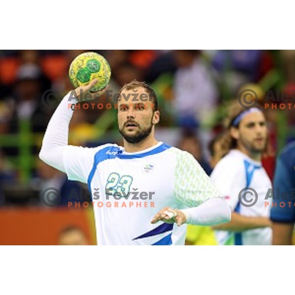 Uros Zorman of Slovenia in action during Olympic handball tournament match between Slovenia and Sweden in Barra Olympic Park at Rio de Janeiro 2016 Olympic games , Brazil on August 11 , 2016