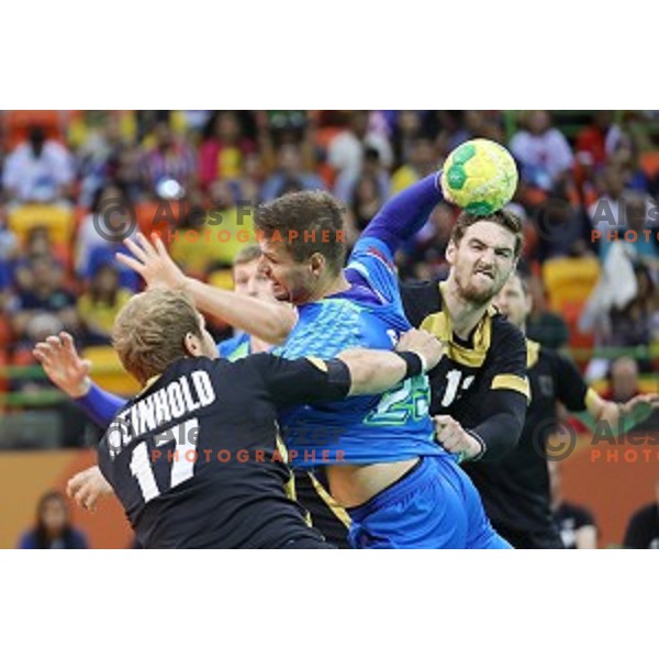 Marko Bezjak of Slovenia in action during Olympic handball tournament match between Slovenia and Germany in Barra Olympic Park at Rio de Janeiro 2016 Olympic games , Brazil on August 13 , 2016