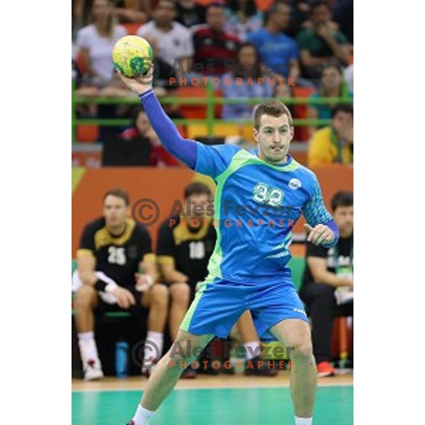 Miha Zarabec of Slovenia in action during Olympic handball tournament match between Slovenia and Germany in Barra Olympic Park at Rio de Janeiro 2016 Olympic games , Brazil on August 13 , 2016