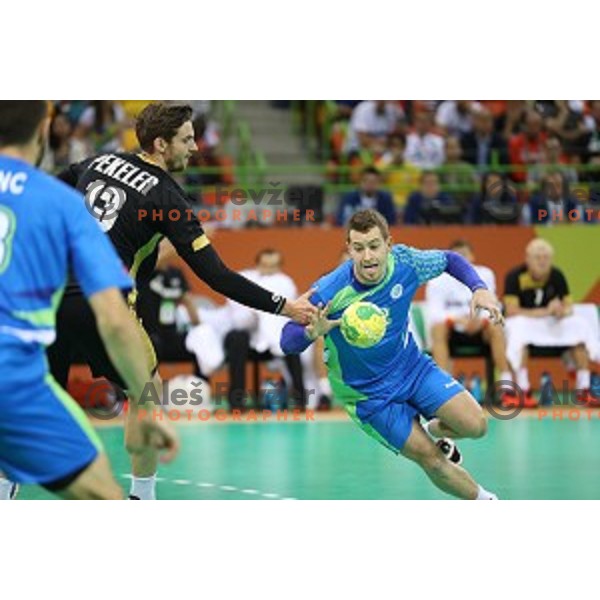 Miha Zarabec of Slovenia in action during Olympic handball tournament match between Slovenia and Germany in Barra Olympic Park at Rio de Janeiro 2016 Olympic games , Brazil on August 13 , 2016