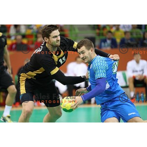 Miha Zarabec of Slovenia in action during Olympic handball tournament match between Slovenia and Germany in Barra Olympic Park at Rio de Janeiro 2016 Olympic games , Brazil on August 13 , 2016