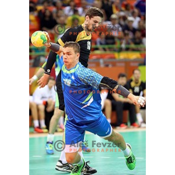 Vid Poteko of Slovenia in action during Olympic handball tournament match between Slovenia and Germany in Barra Olympic Park at Rio de Janeiro 2016 Olympic games , Brazil on August 13 , 2016