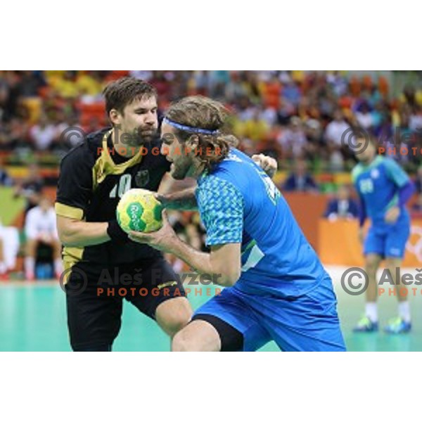 Dean Bombac of Slovenia in action during Olympic handball tournament match between Slovenia and Germany in Barra Olympic Park at Rio de Janeiro 2016 Olympic games , Brazil on August 13 , 2016