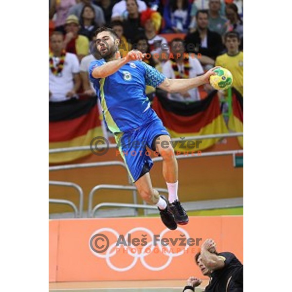 Blaz Janc of Slovenia in action during Olympic handball tournament match between Slovenia and Germany in Barra Olympic Park at Rio de Janeiro 2016 Olympic games , Brazil on August 13 , 2016