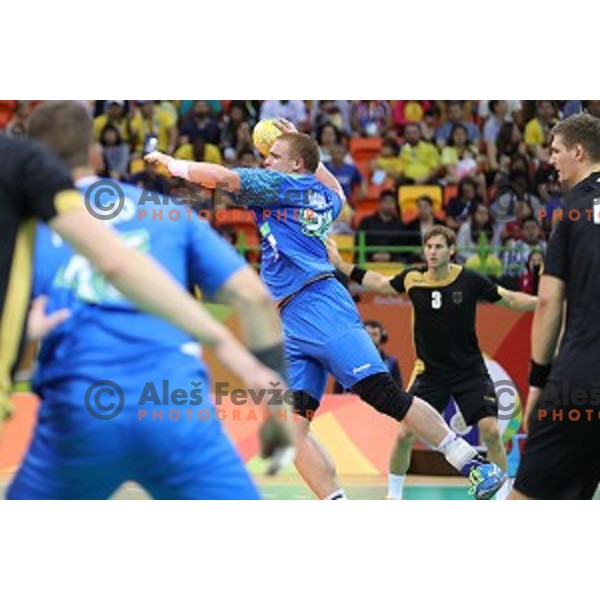 Matej Gaber of Slovenia in action during Olympic handball tournament match between Slovenia and Germany in Barra Olympic Park at Rio de Janeiro 2016 Olympic games , Brazil on August 13 , 2016