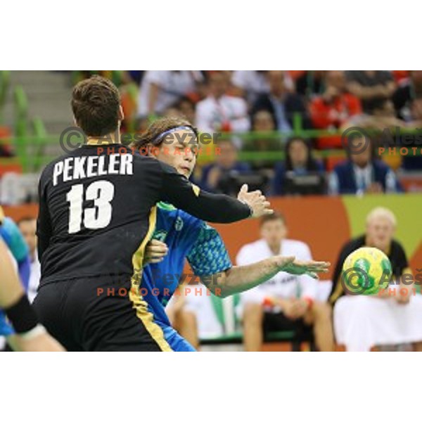 Jure Dolenec of Slovenia in action during Olympic handball tournament match between Slovenia and Germany in Barra Olympic Park at Rio de Janeiro 2016 Olympic games , Brazil on August 13 , 2016