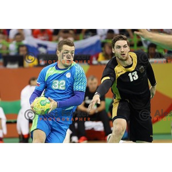 Miha Zarabec of Slovenia in action during Olympic handball tournament match between Slovenia and Germany in Barra Olympic Park at Rio de Janeiro 2016 Olympic games , Brazil on August 13 , 2016