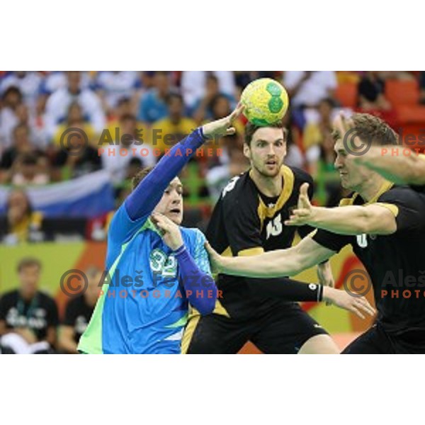 Miha Zarabec of Slovenia in action during Olympic handball tournament match between Slovenia and Germany in Barra Olympic Park at Rio de Janeiro 2016 Olympic games , Brazil on August 13 , 2016