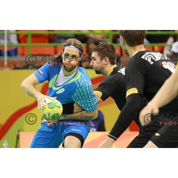 Dean Bombac of Slovenia in action during Olympic handball tournament match between Slovenia and Germany in Barra Olympic Park at Rio de Janeiro 2016 Olympic games , Brazil on August 13 , 2016