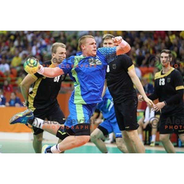 Matej Gaber of Slovenia in action during Olympic handball tournament match between Slovenia and Germany in Barra Olympic Park at Rio de Janeiro 2016 Olympic games , Brazil on August 13 , 2016